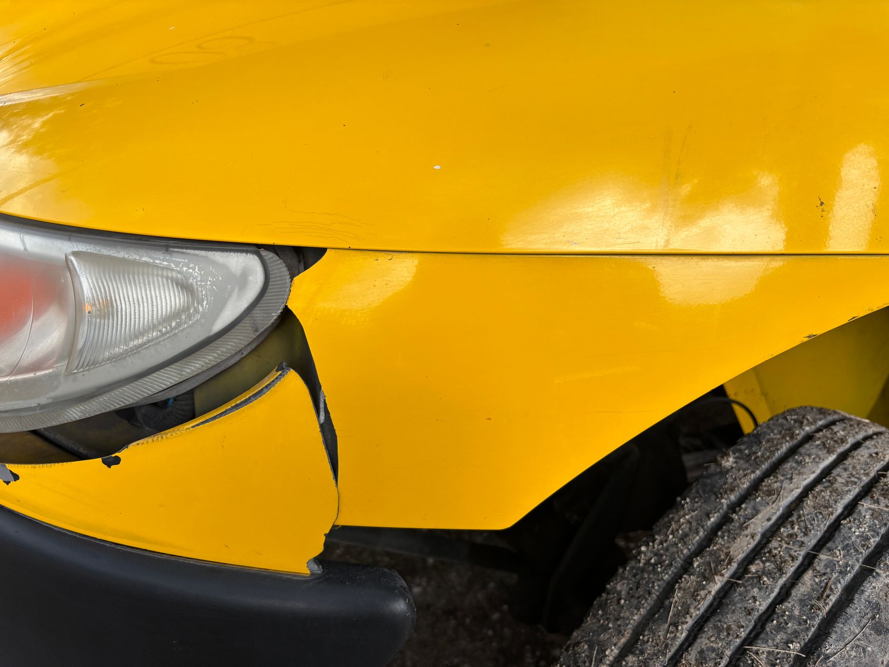 Close-up of accident damage to a vehicle
